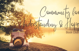 The image shows a person on a shoreline at sunset reading a book. The person has a straw hat on and blue jeans with a white shirt. There is a large tree in the background. The words read, "Community for Understanding & Hope Book Club"